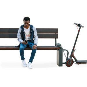 Solar powered bench charging e-scooter